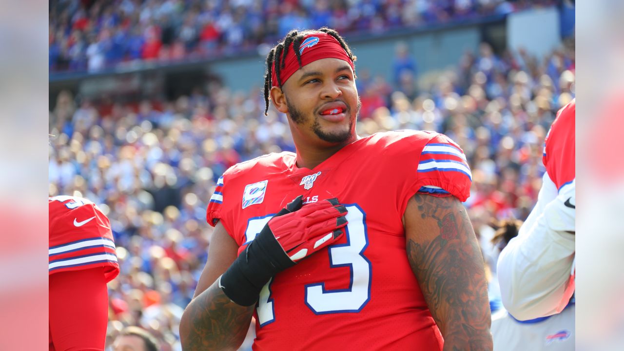 Buffalo Bills offensive tackle Dion Dawkins (73) warms up before