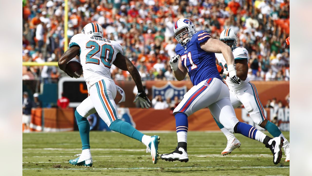 Buffalo Bills running back Thurman Thomas (34) fumbles the ball