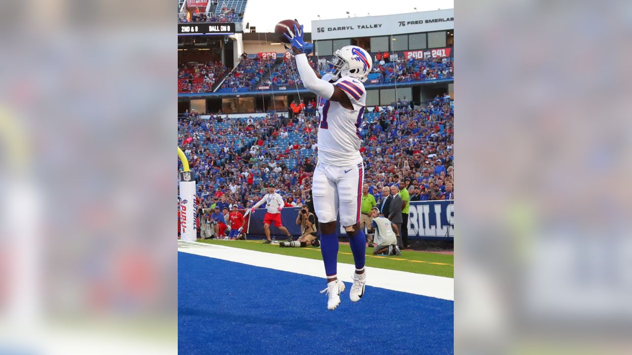 Buffalo Bills defensive tackle Prince Emili (94) and defensive end Daniel  Joseph (96) celebrate with fans after a preseason NFL football game against  the Indianapolis Colts in Orchard Park, N.Y., Saturday, Aug.