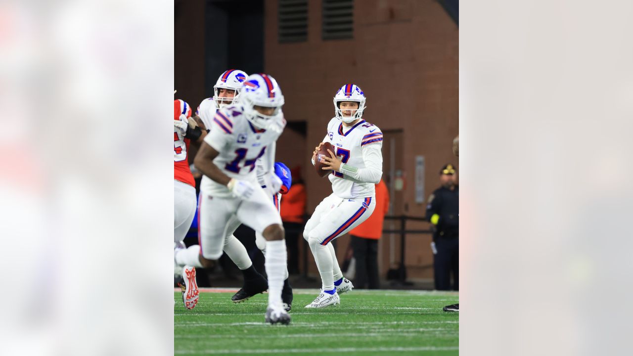 FOXBOROUGH, MA - DECEMBER 01: Buffalo Bills running back James Cook (28)  escapes a tackle during a game between the New England Patriots and the  Buffalo Bills on December 1, 2022, at