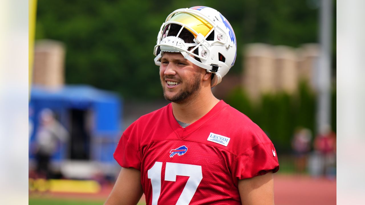 Fans draw similarities between Josh Allen's helmet and Giants gear after  Bills QB's look goes viral in training camp