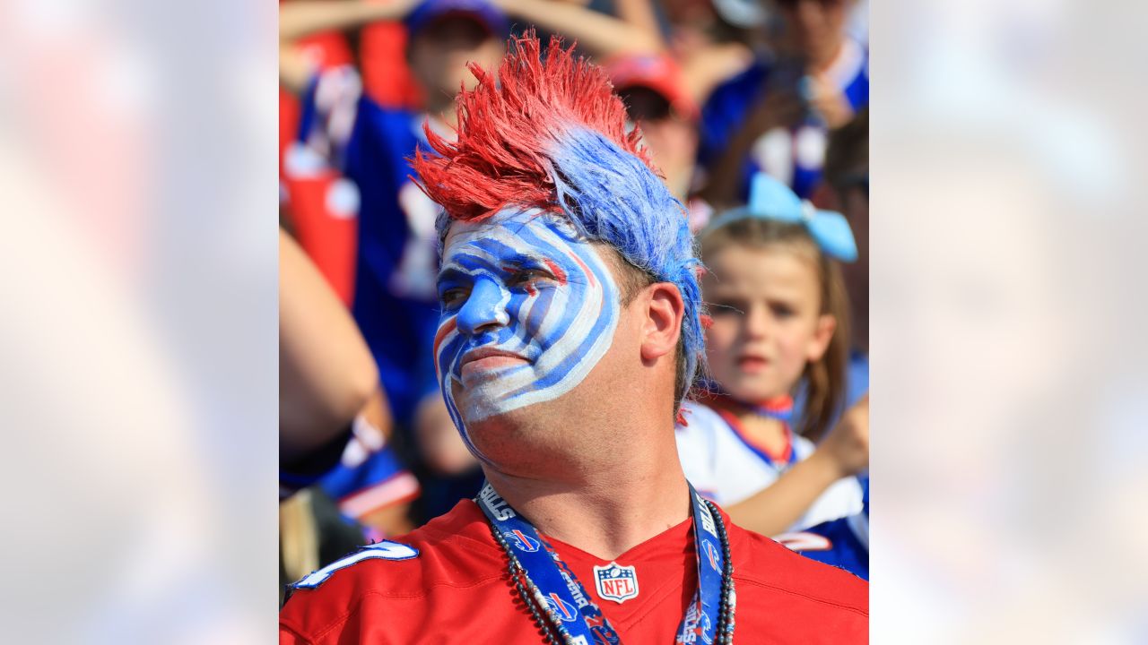 Bills Fans Playing cornhole at the Bills Mafia House show support for Damar  - 2022 Buffalo Bills - Bills Fans