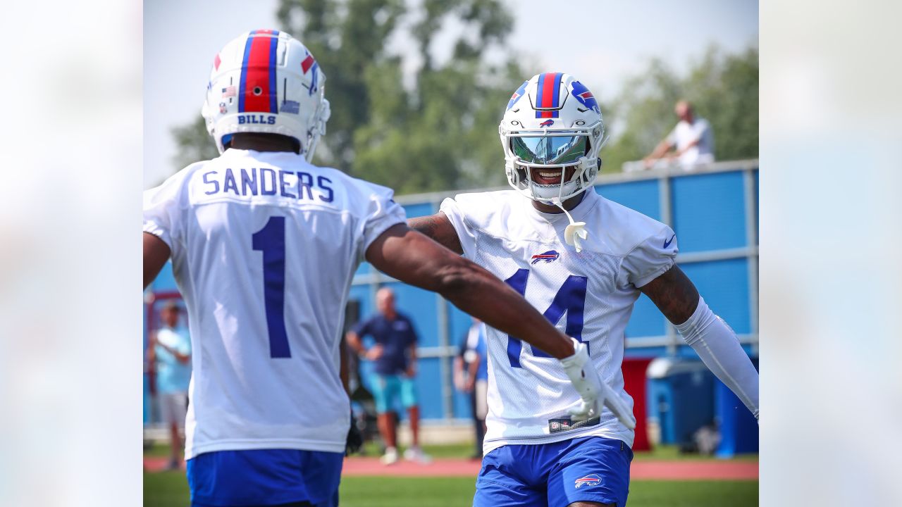 I stick by the Buffalo Bills - Bills 3rd round draft pick Spencer Brown  standing next to Bills' multimedia journalist Maddy Glab..