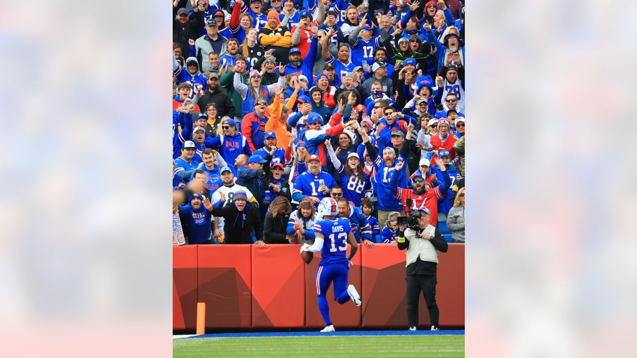 Gabe Davis celebrates a TD with Bills G Rodger Saffold - 2022