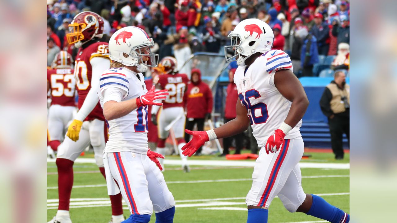 Buffalo Bills running back Devin Singletary (26) warms up before