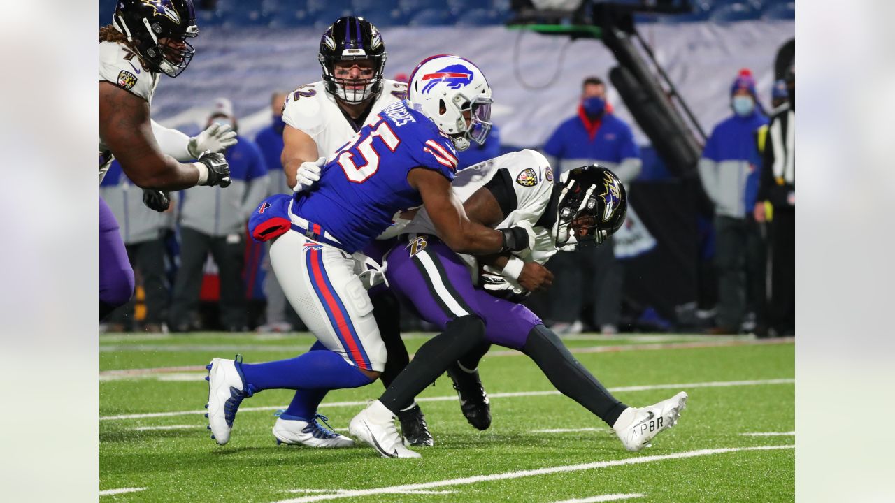 Buffalo Bills' Jerry Hughes (55) sacks Baltimore Ravens quarterback Lamar  Jackson (8) during th …