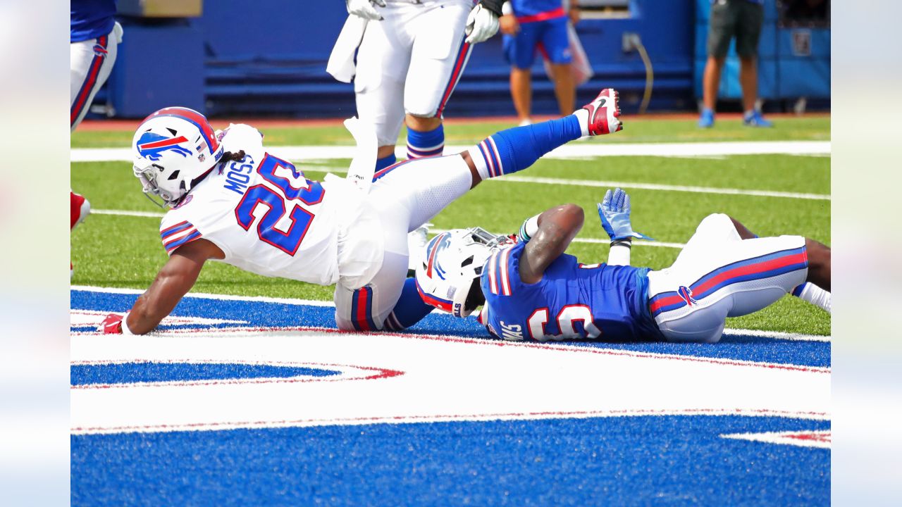 FOXBOROUGH, MA - DECEMBER 26: Buffalo Bills quarterback Josh Allen (17)  moves Buffalo Bills running back Devin Singletary (26) during a game  between the New England Patriots and the Buffalo Bills on