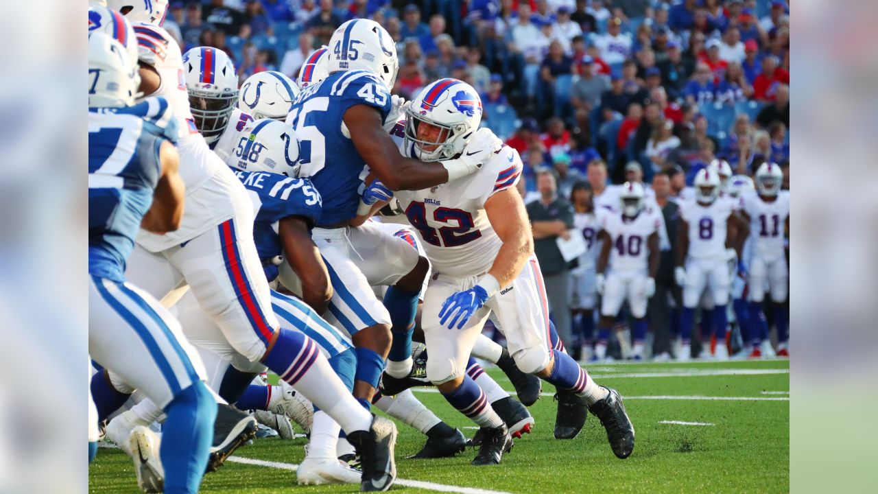 Buffalo Bills defensive tackle Prince Emili (94) and defensive end Daniel  Joseph (96) celebrate with fans after a preseason NFL football game against  the Indianapolis Colts in Orchard Park, N.Y., Saturday, Aug.