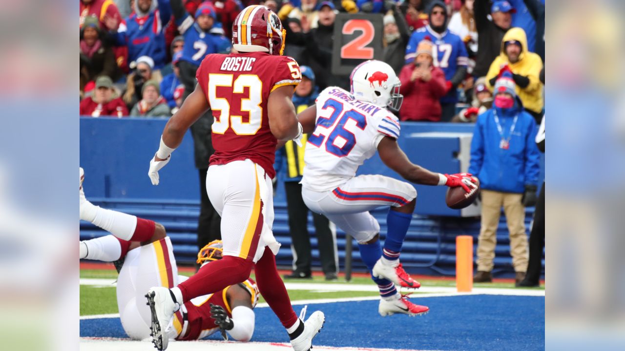 Buffalo Bills running back Devin Singletary (26) warms up before