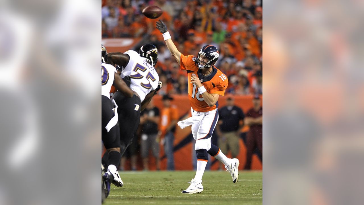 Manning fires seven TD passes as Broncos crush Ravens