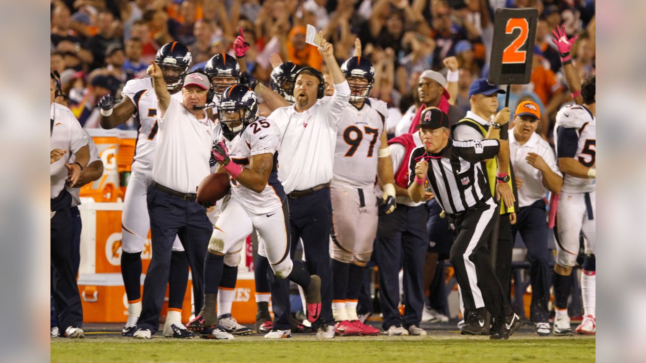 A Seattle Seahawks fan wearing a Russell Wilson jersey waves a towel next  to a Denver Broncos fan wearing a Russell Wilson jersey before an NFL  football game, Monday, Sept. 12, 2022