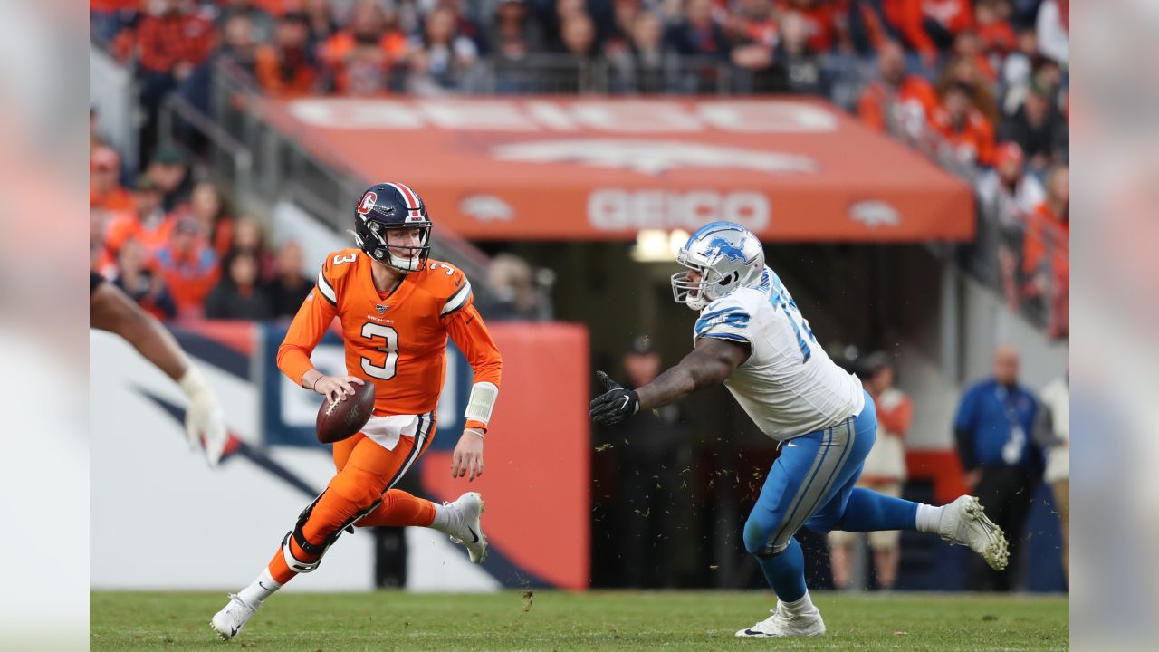 Denver, Colorado, USA. 8th Jan, 2023. Chargers WR MIKE WILLIAMS tries to  shake off a tackle by Broncos S JUSTIN SIMMONS during the 2nd. Half at  Empower Field at Mile High Sunday