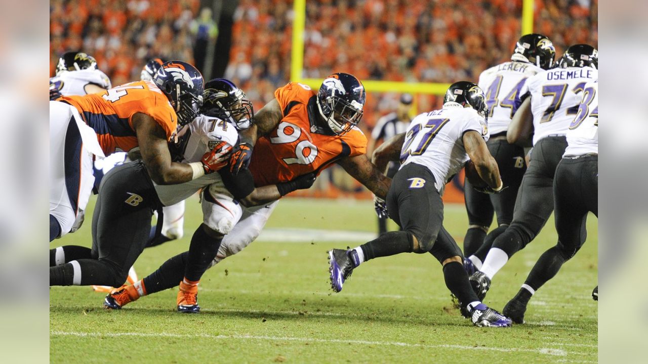 Manning throws 7 TDs as Broncos stampede past defending champion Ravens