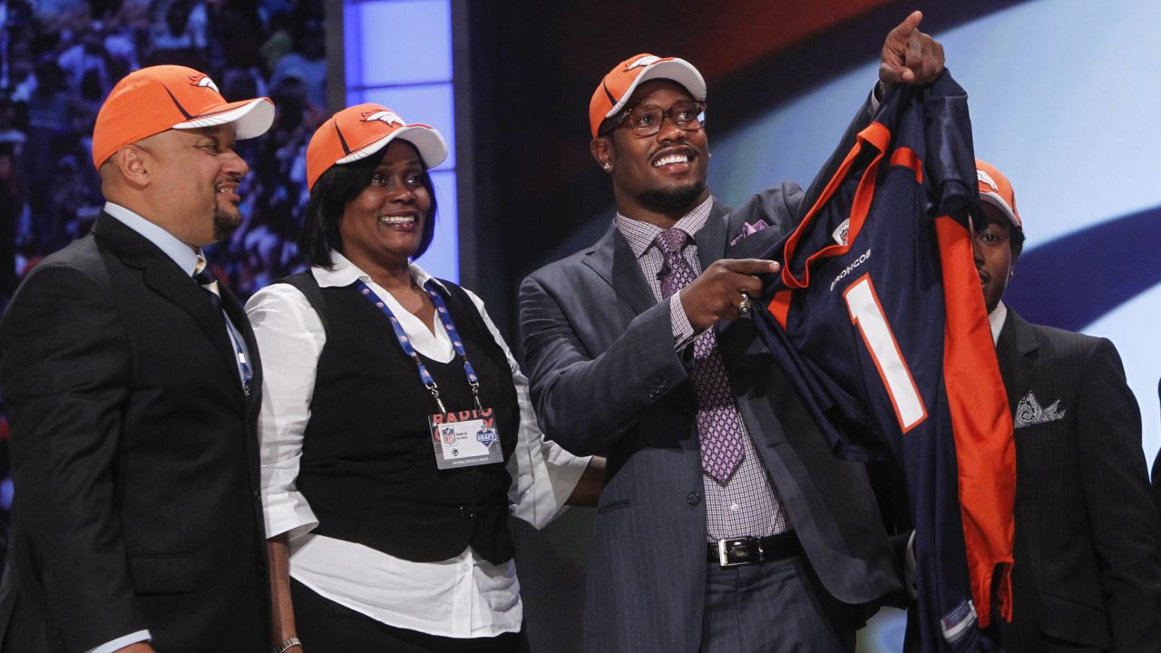 April 28, 2011: Von Miller, right, gestures alongside his family after he was selected as the second-overall pick by the Denver Broncos in the first round of the NFL Draft at Radio City Music Hall in New York City. (AP Photo/Jason DeCrow)