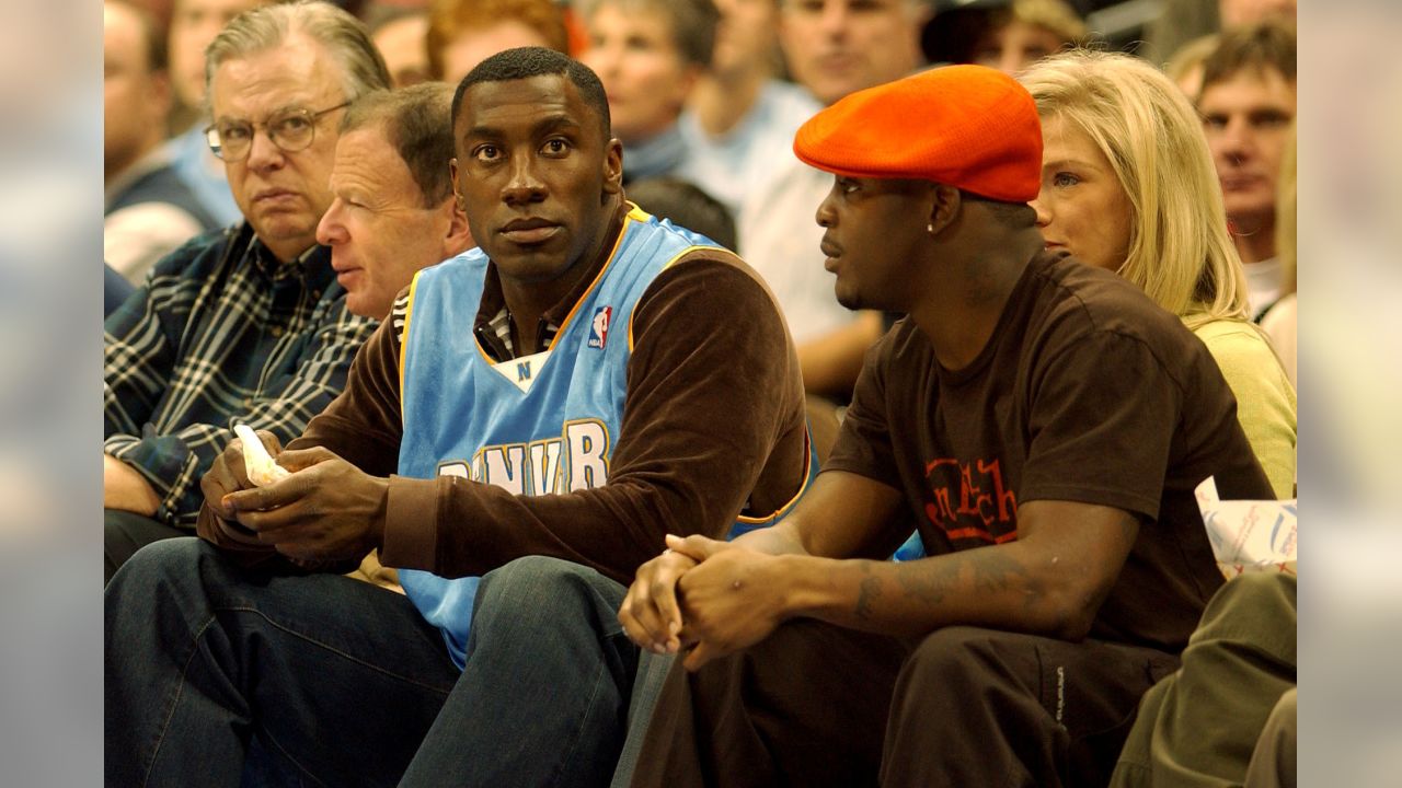 Broncos legend Peyton Manning celebrates Nuggets championship courtside