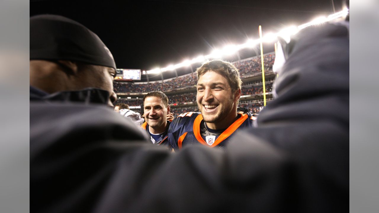 Jan. 8, 2012 - Denver, CO, USA - Denver Broncos QB TIM TEBOW runs for big  yardage against the Steelers during the 1st. half at Sports Authority Field  at Mile High Sunday