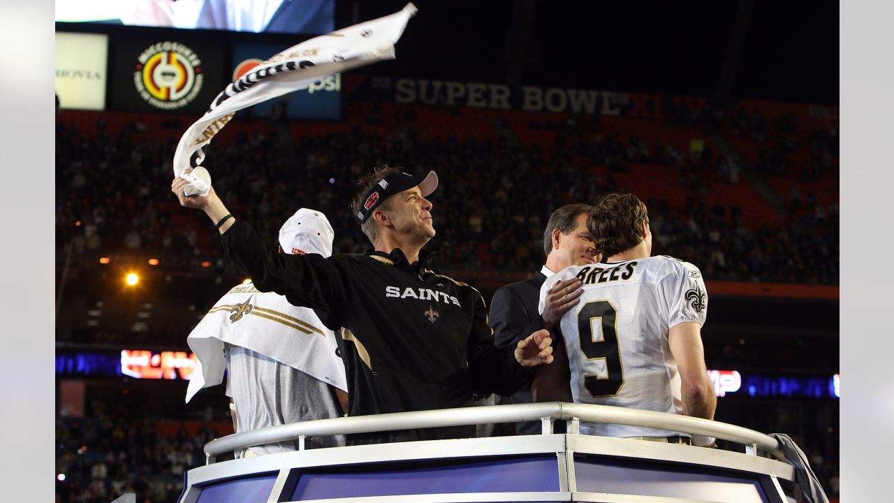 New Orleans Saints quarter back Drew Brees kisses the Vince Lombardi trophy  after winning Super Bowl XLIV at Sun Life Stadium in Miami on February 7,  2010. The Saints defeated the Indianapolis