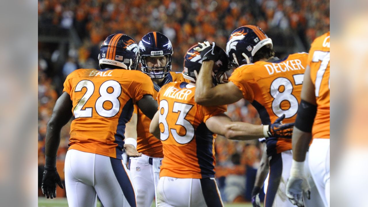 Manning throws 7 TDs as Broncos stampede past defending champion Ravens