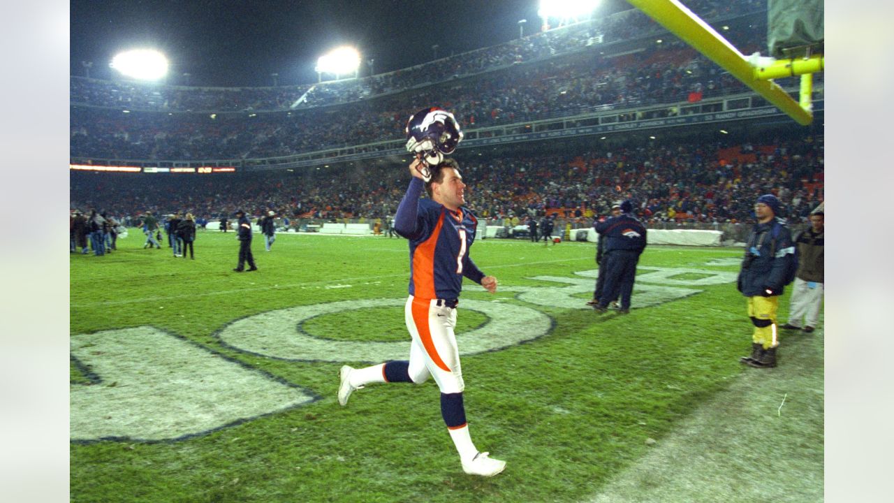 Denver Broncos' kicker Jason Elam (1) and teammate Nate Jackson