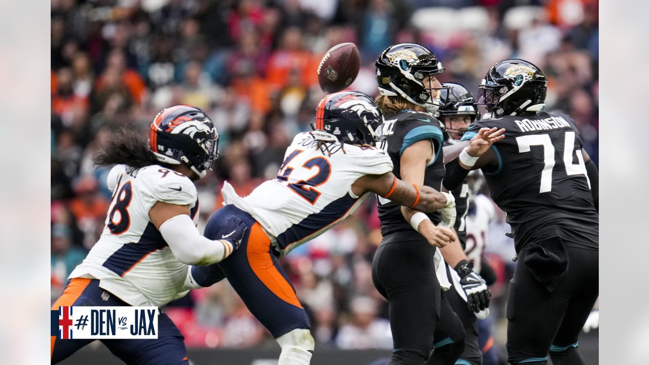 Denver Broncos linebacker Jonathan Kongbo (90) walks off the field after an  NFL football game against the Jacksonville Jaguars at Wembley Stadium in  London, Sunday, Oct. 30, 2022. The Denver Broncos defeated