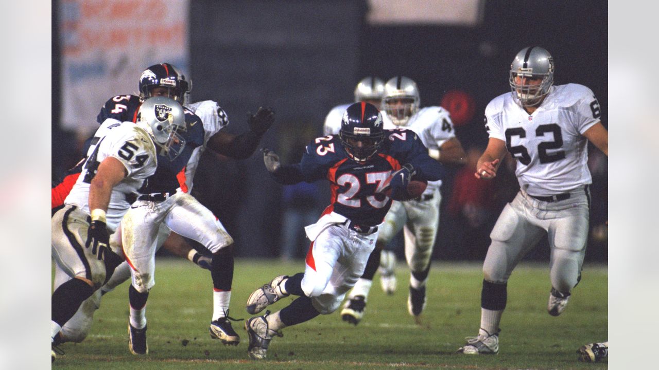 RAIDERS, Oakland Raiders Napoleon Kaufman dodges a tackle a…