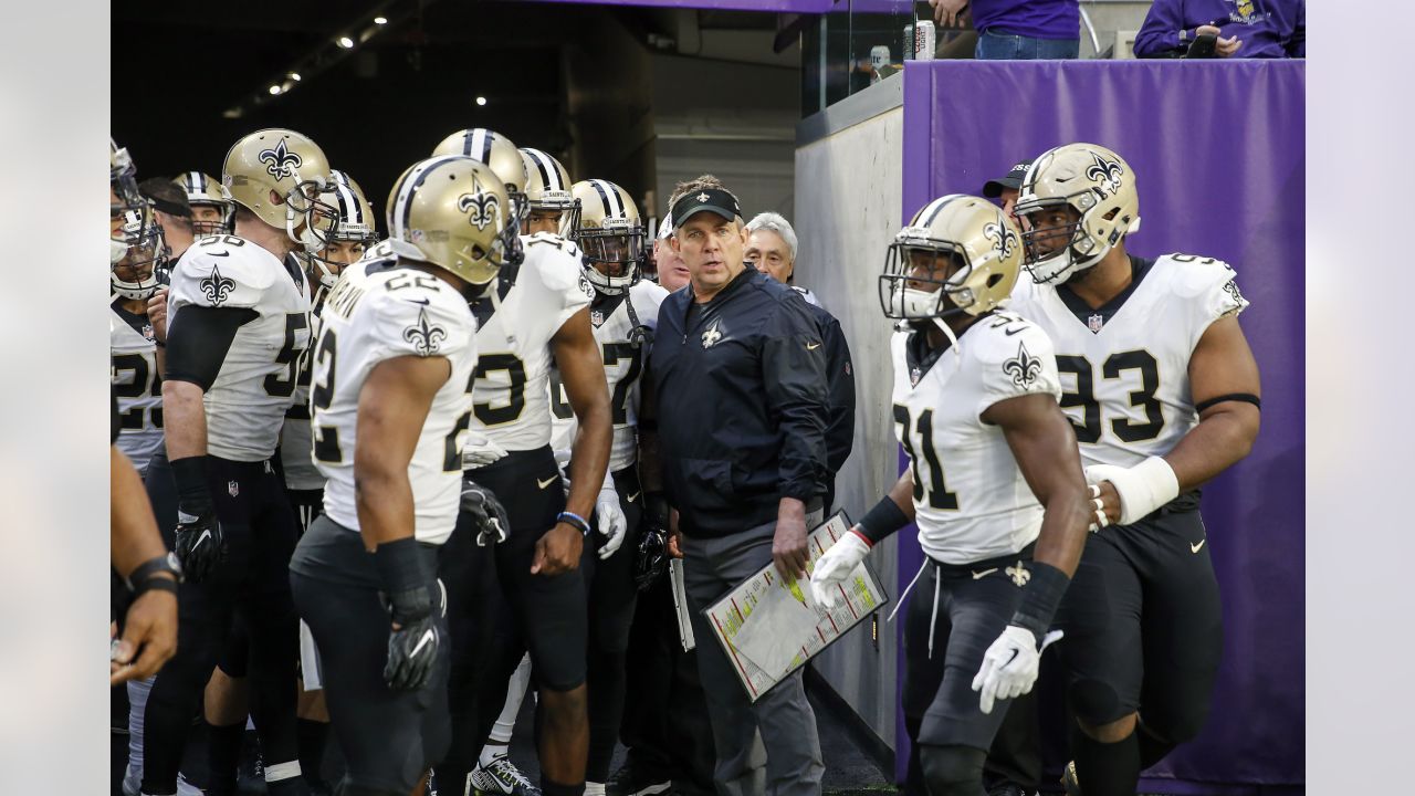 24 January 2010: Saints quarterback Drew Brees (9) holds up the NFC  Championship trophy after game action of the NFC Championship between the  Minnesota Vikings and the New Orleans Saints at the