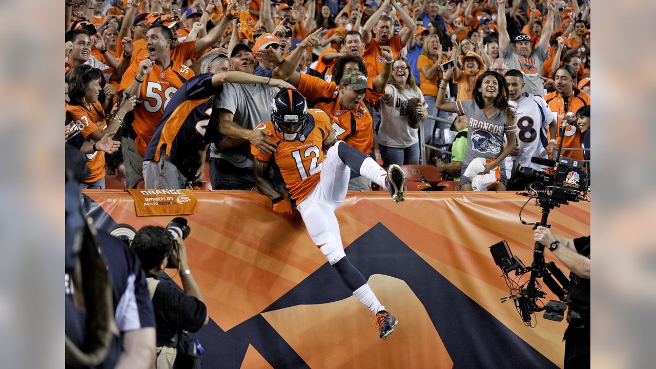 Ex-Portland State standout Julius Thomas catches 2 of Peyton Manning's 7  touchdown passes 