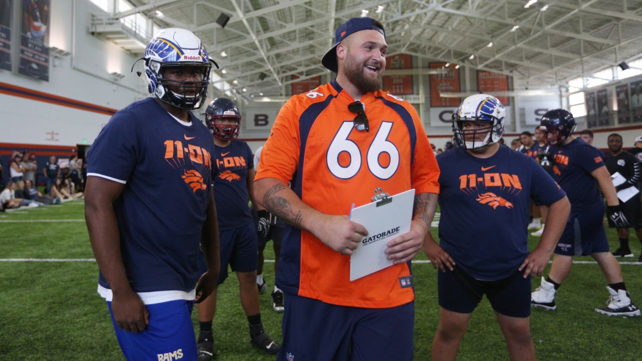 Dalton Risner helps out at the annual high school 7-on-7 and Lineman Challenge championship tournaments at UCHealth Training Center on June 15, 2019.