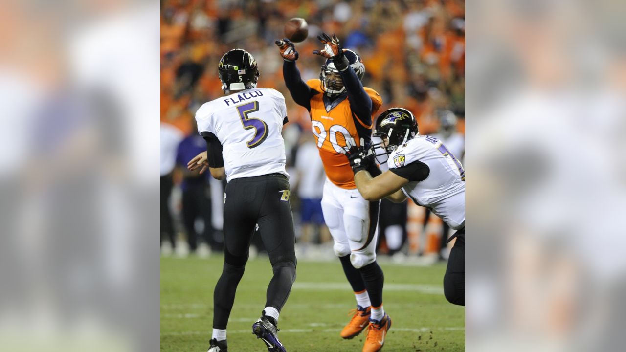 Manning throws 7 TDs as Broncos stampede past defending champion Ravens