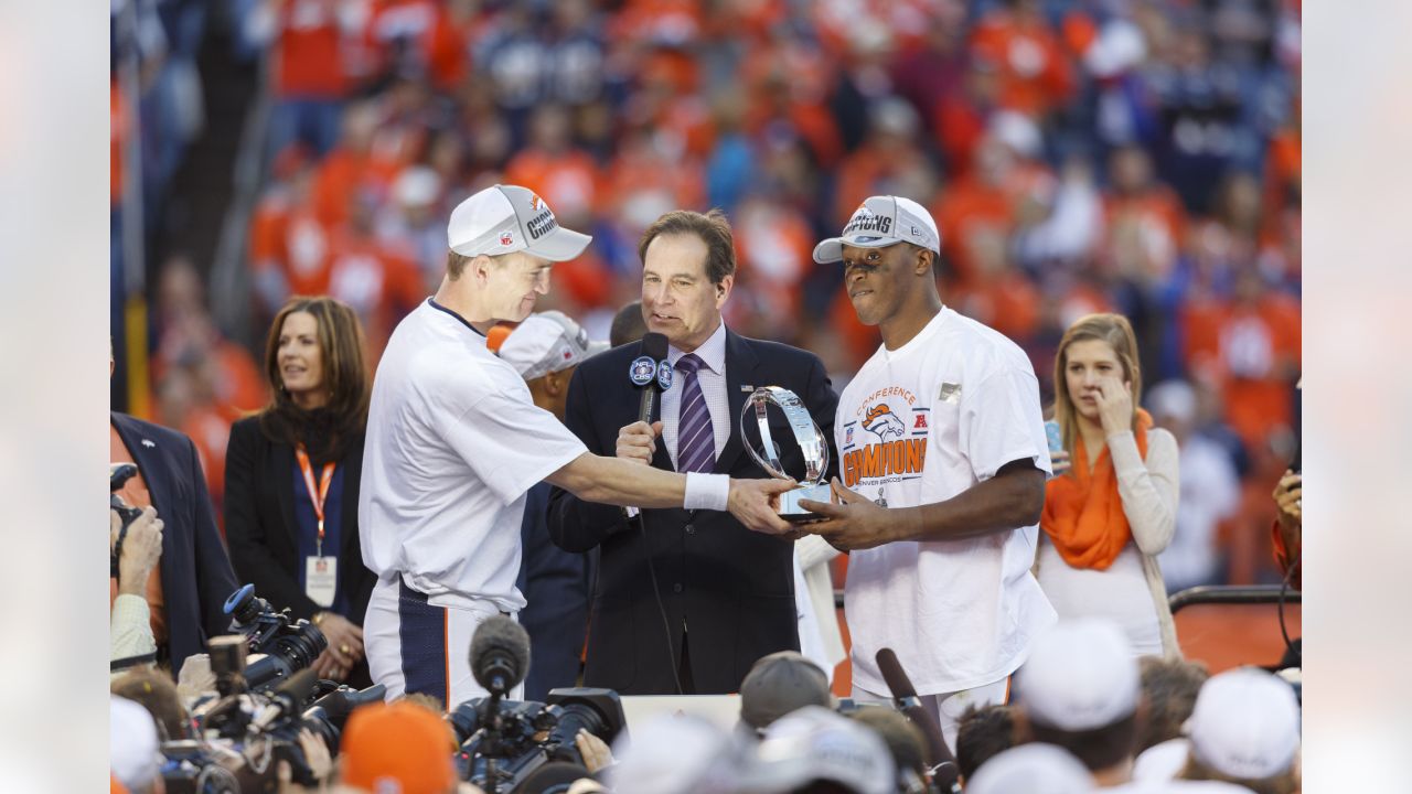 Broncos legend Peyton Manning celebrates Nuggets championship courtside