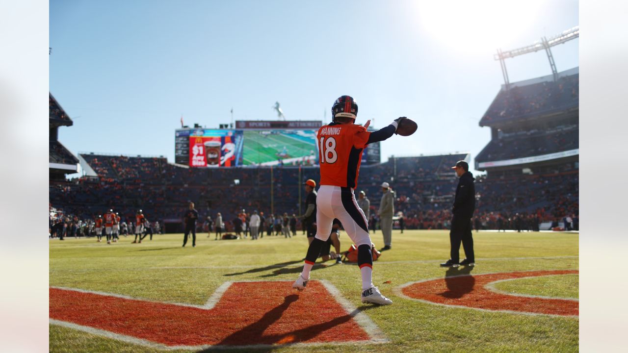 Denver Broncos Peyton Manning throws against the New England Patriots  during the AFC Championship game at Sport Authority Field at Mile High in  Denver on January 24, 2016. Denver advances to Super