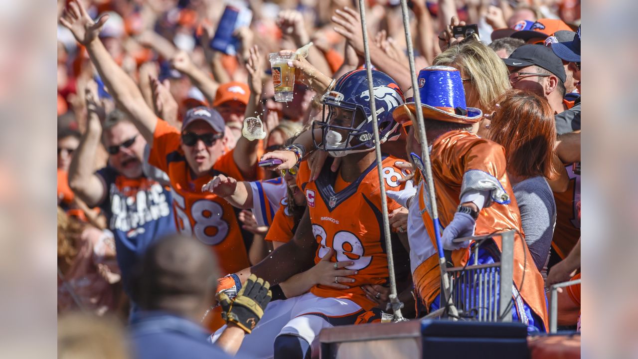 Aqib Talib celebrates milestone pick-six with leap into arms of Broncos fans