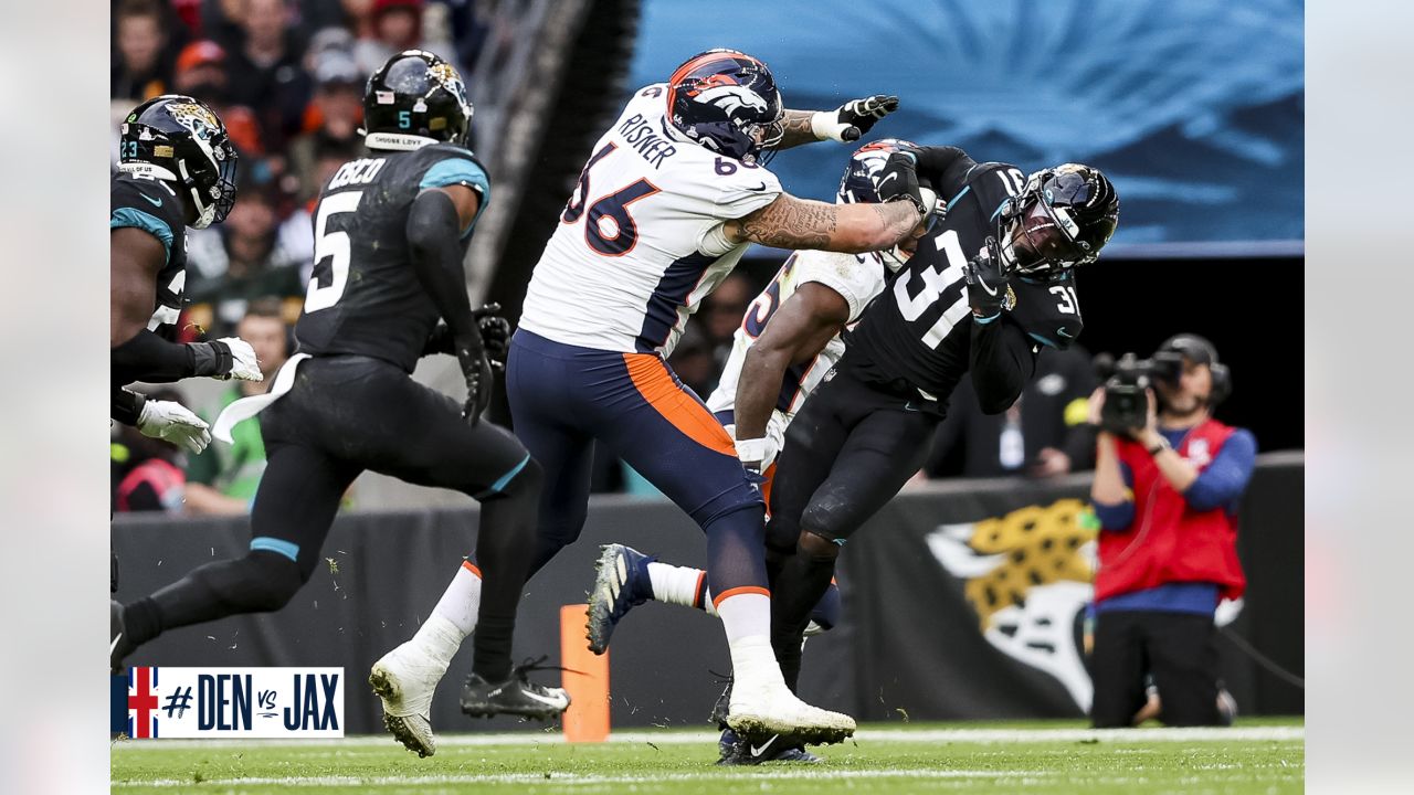 Jacksonville Jaguars safety Andre Cisco (5) walks off the field after an  NFL football game against the Denver Broncos at Wembley Stadium in London  on Sunday, Oct. 30, 2022. Broncos defeated the