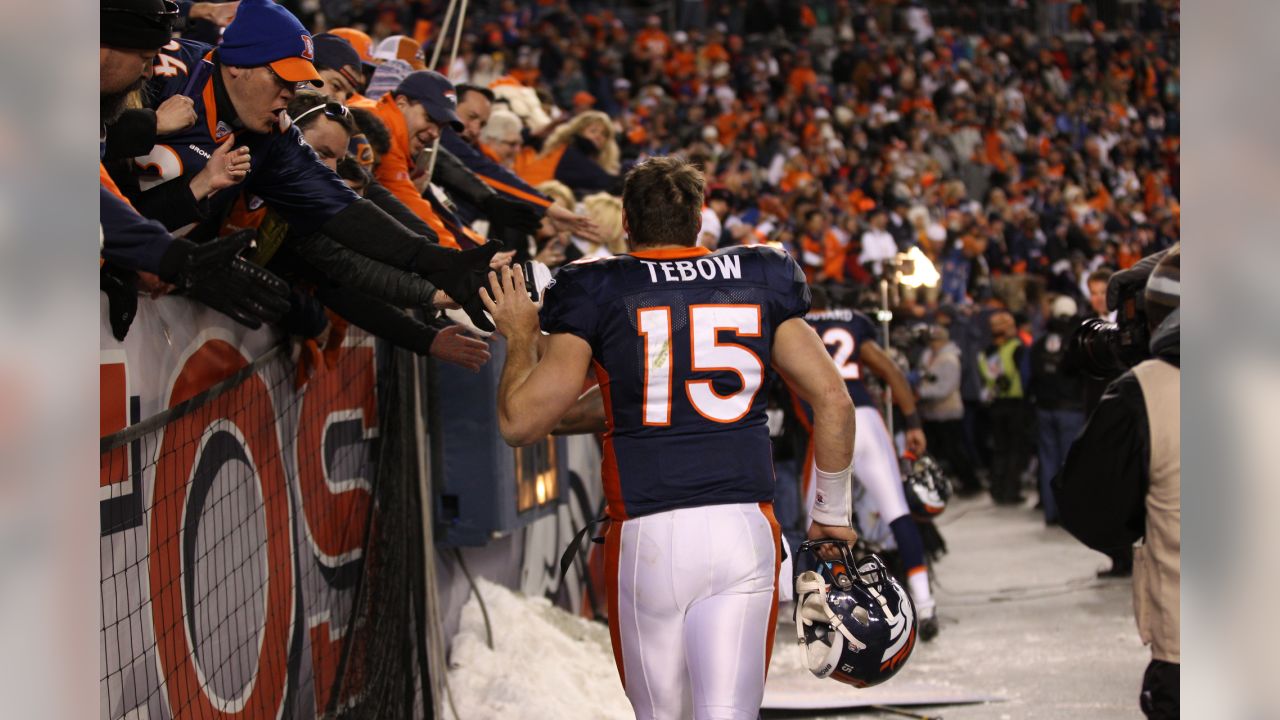 Jan. 8, 2012 - Denver, CO, USA - Denver Broncos QB TIM TEBOW runs for big  yardage against the Steelers during the 1st. half at Sports Authority Field  at Mile High Sunday