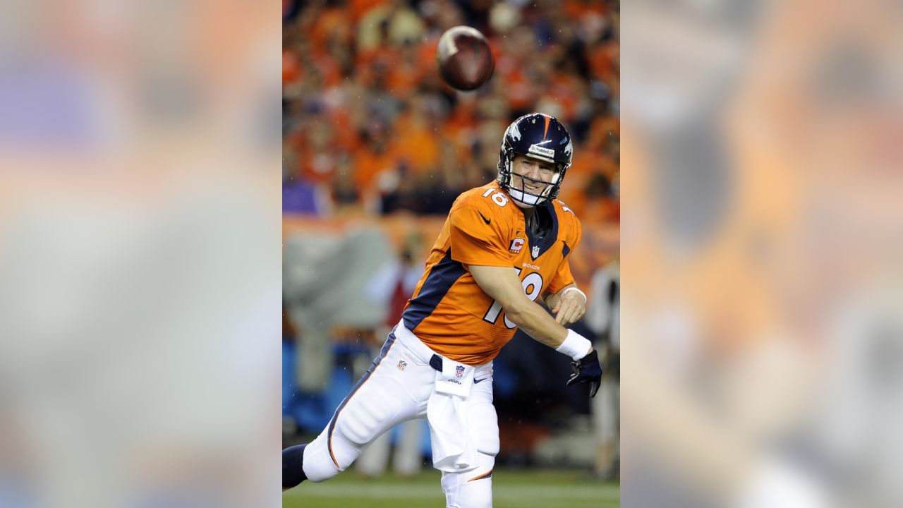 Manning throws 7 TDs as Broncos stampede past defending champion Ravens