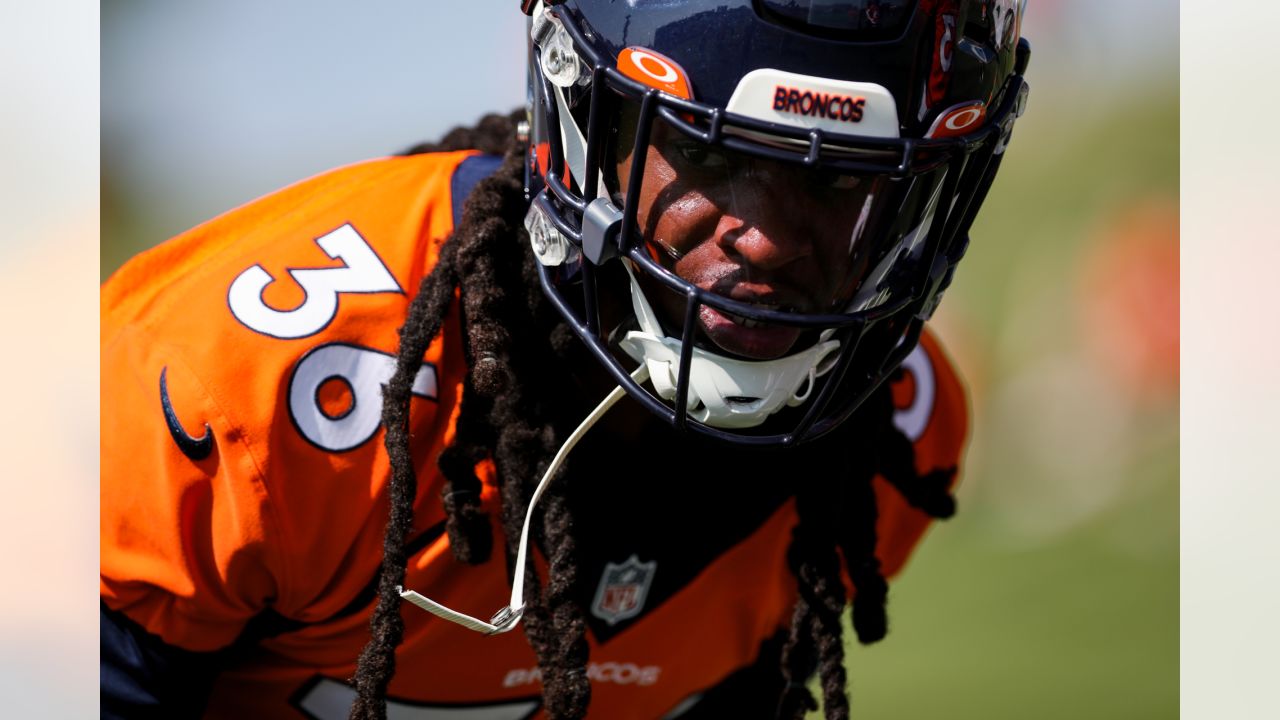 The Denver Broncos alternate helmet is displayed for fans during NFL  Welcome Back festivities at the Broncos' NFL football training camp  Saturday, July 29, 2023, in Centennial, Colo. (AP Photo/David Zalubowski  Stock