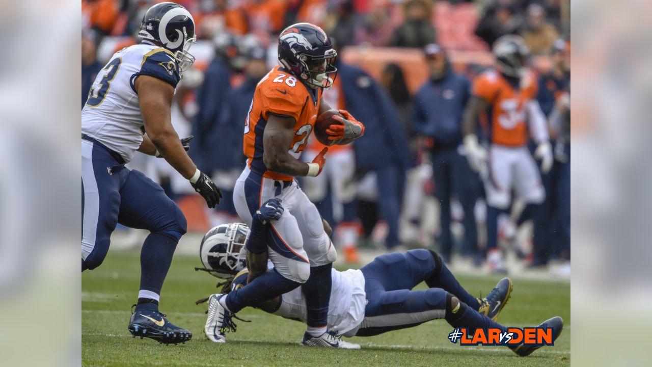 October 14, 2018: Denver Broncos running back Phillip Lindsay (30) with a  run during the first quarter of an NFL matchup between the Los Angeles Rams  and the Denver Broncos at Broncos