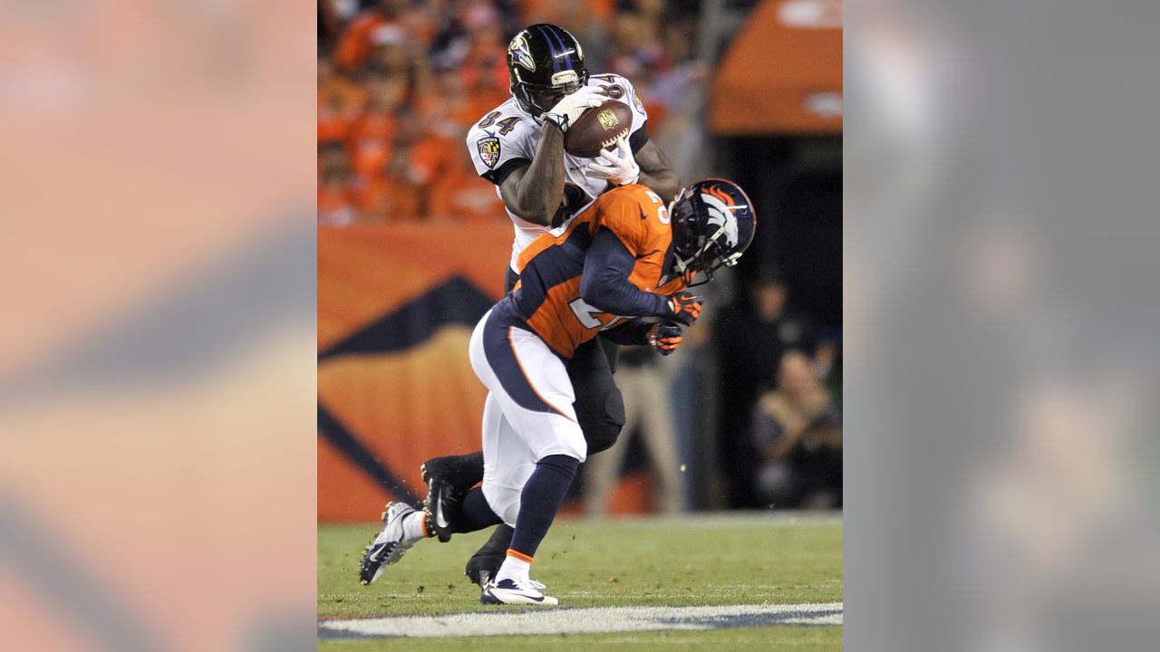 Manning throws 7 TDs as Broncos stampede past defending champion Ravens