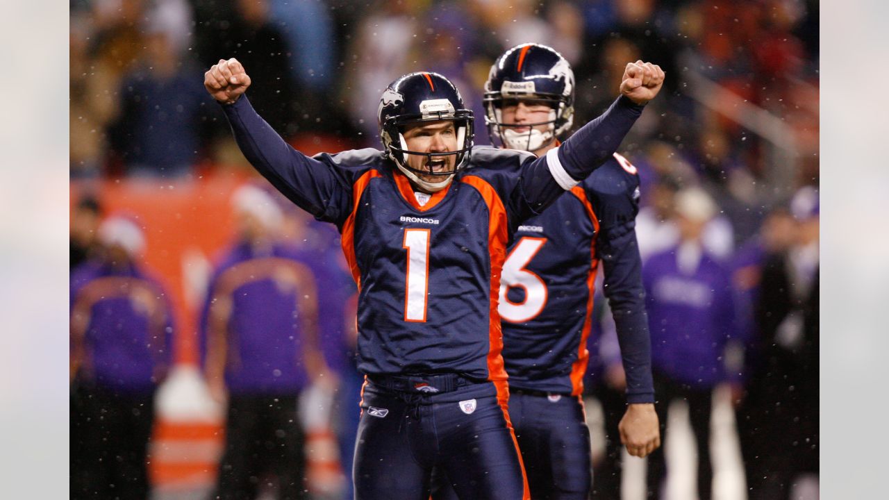 Denver Broncos' kicker Jason Elam (1) and teammate Nate Jackson