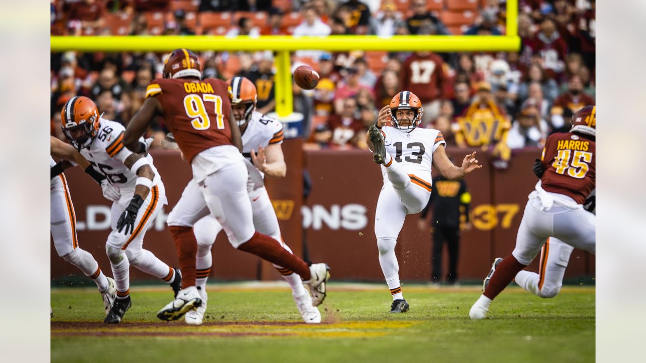 Cleveland Browns punter Corey Bojorquez (13) gets off a punt from