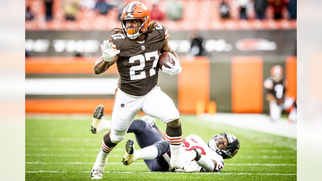 Cleveland Browns wide receiver Derrick Willies (84) holds off Cleveland  Browns defensive back Sheldrick Redwine (33) after a pass reception during  practice at the NFL football team's training facility Wednesday, July 31