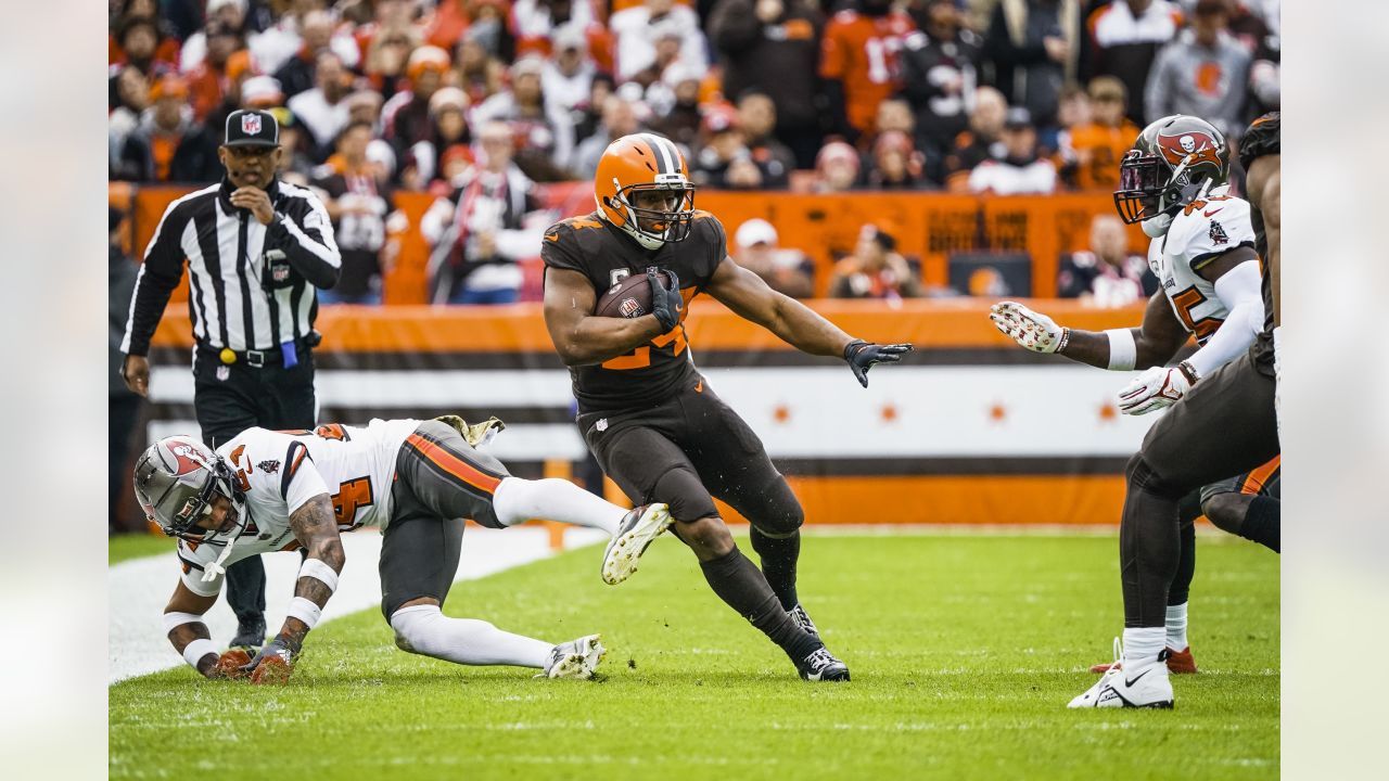 Cleveland Browns running back Nick Chubb, right, scores a touchdown in  overtime of the team's NFL football game against the Tampa Bay Buccaneers  in Cleveland, Sunday, Nov. 27, 2022. The Browns won