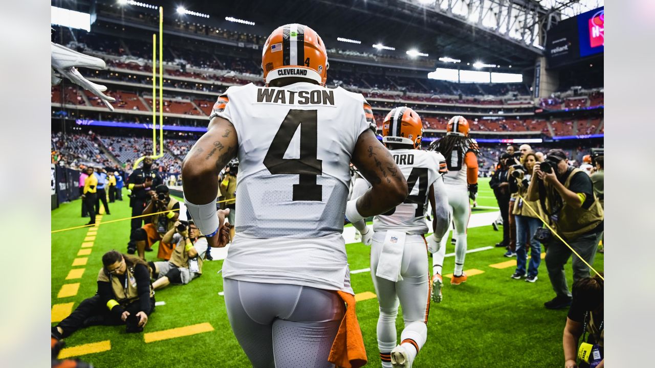 Cleveland Browns DESHAUN WATSON (4) escapes Houston Texans defenders during  the game between the Cleveland Browns and the Houston Texans in Houston,  Texas at NRG Stadium on December 4, 2022. The Cleveland