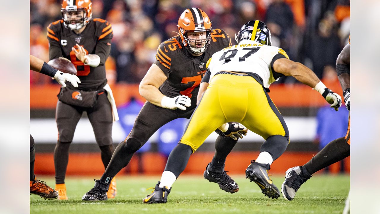 FILE - In this Sunday, Nov. 11, 2018 file photo, Cleveland Browns offensive  tackle Joel Bitonio celebrates after the Browns defeated the Atlanta  Falcons 28-16 in an NFL football game in Cleveland.