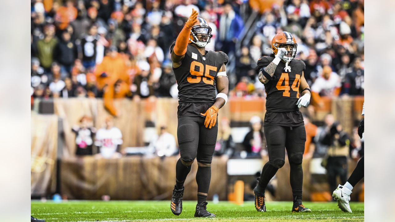 Cleveland Browns defensive end Myles Garrett (95) celebrates after sacking  Tampa Bay Buccaneers quarterback Tom Brady (12) during the second half of  an NFL football game in Cleveland, Sunday, Nov. 27, 2022.