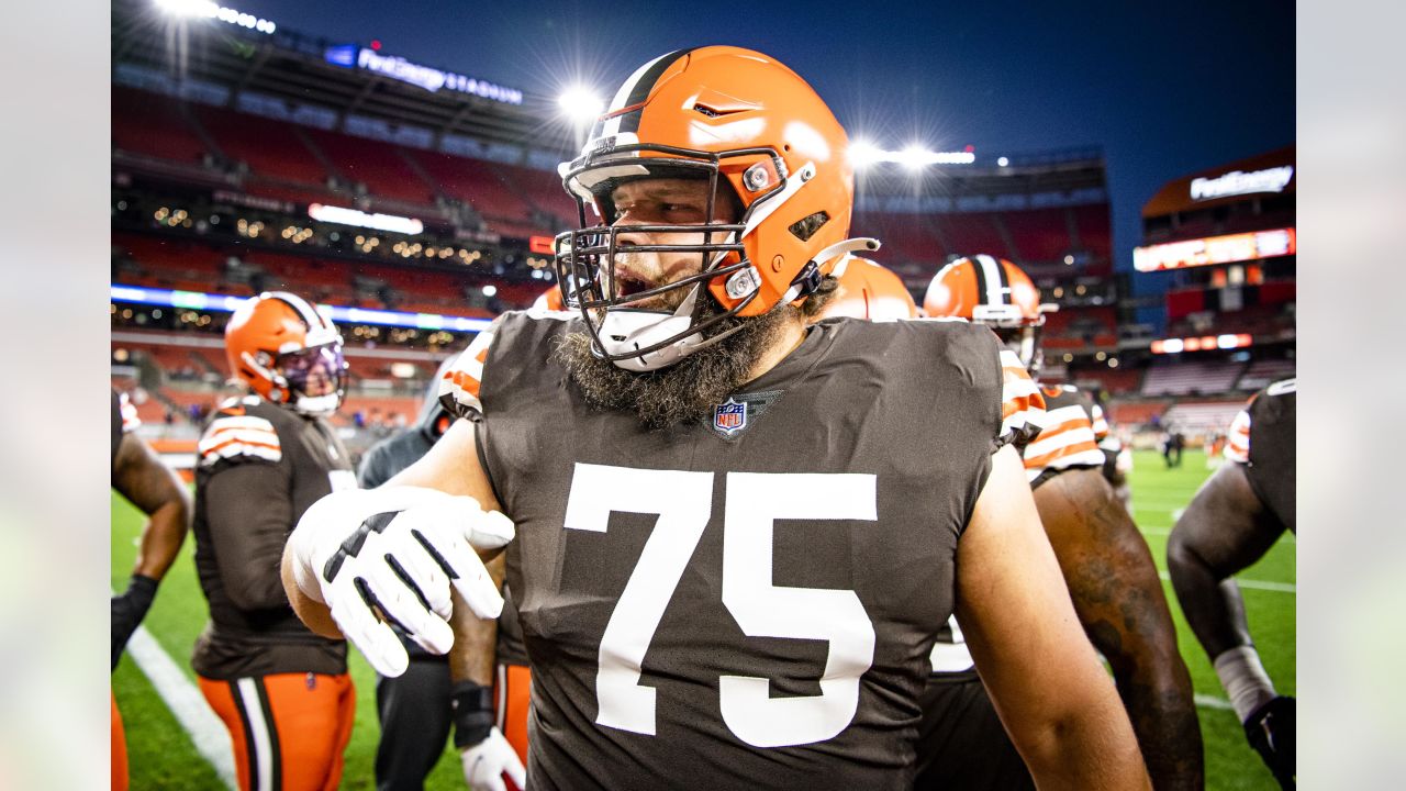 Joel Bitonio and 2 Cleveland Browns w/ down stock vs.Miami Dolphins