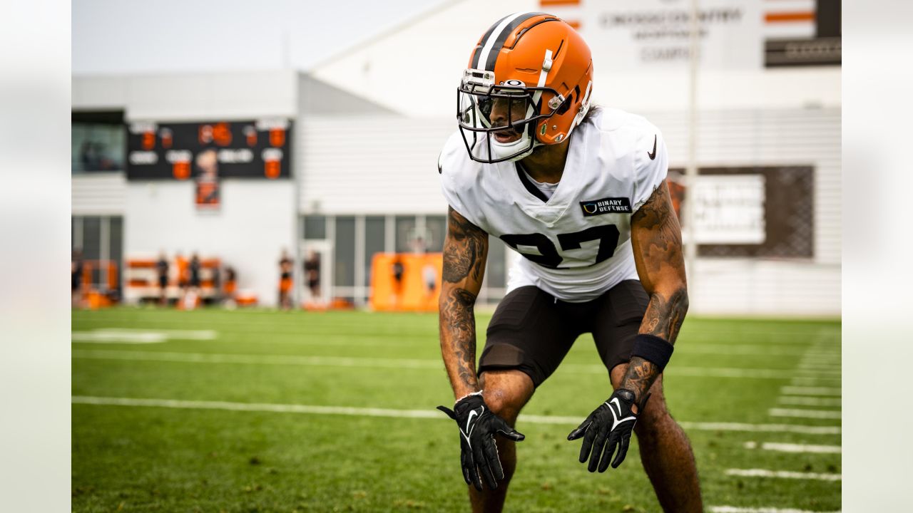 Cleveland Browns defensive tackle Devaroe Lawrence walks out on the field  during practice at the NFL football team's training camp facility,  Thursday, July 25, 2019, in Berea, Ohio. (AP Photo/Tony Dejak Stock