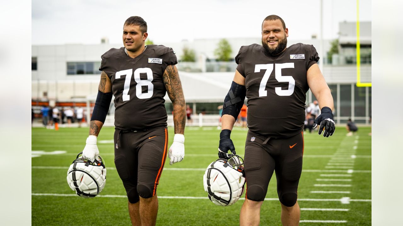 Which Browns offensive tackle is standing out in training camp? 