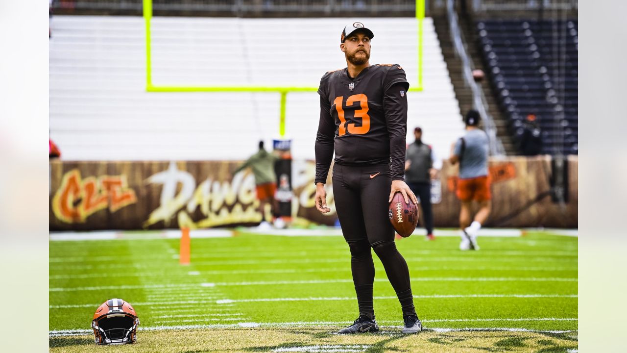 Cleveland Browns punter Corey Bojorquez (13) warms up before an