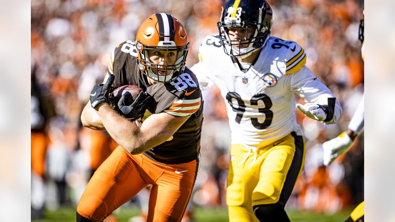 Cleveland Browns tight end Harrison Bryant (88) fumbles the football while  being tackled by Las …